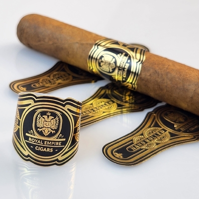 Beli Label Cerutu Kustom Kualitas Tinggi Tahan Air Penjualan Panas 2025 Cetak Foil Emas dengan Logo & Merek Pribadi Cetak Timbul Stiker Cepat online manufacture